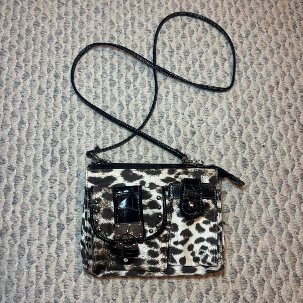 KATHY animal print crossbody with silver accents and multiple compartments